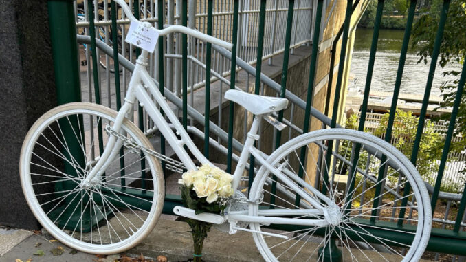 A photo of John Corcoran's ghost bike on Memorial Drive