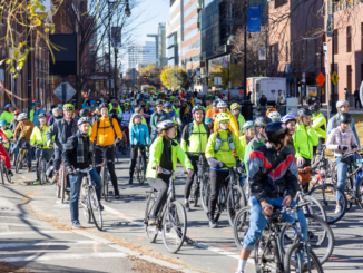 Image of 2024 ride - many cyclists wearing yellow.
