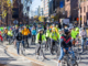 Image of 2024 ride - many cyclists wearing yellow.
